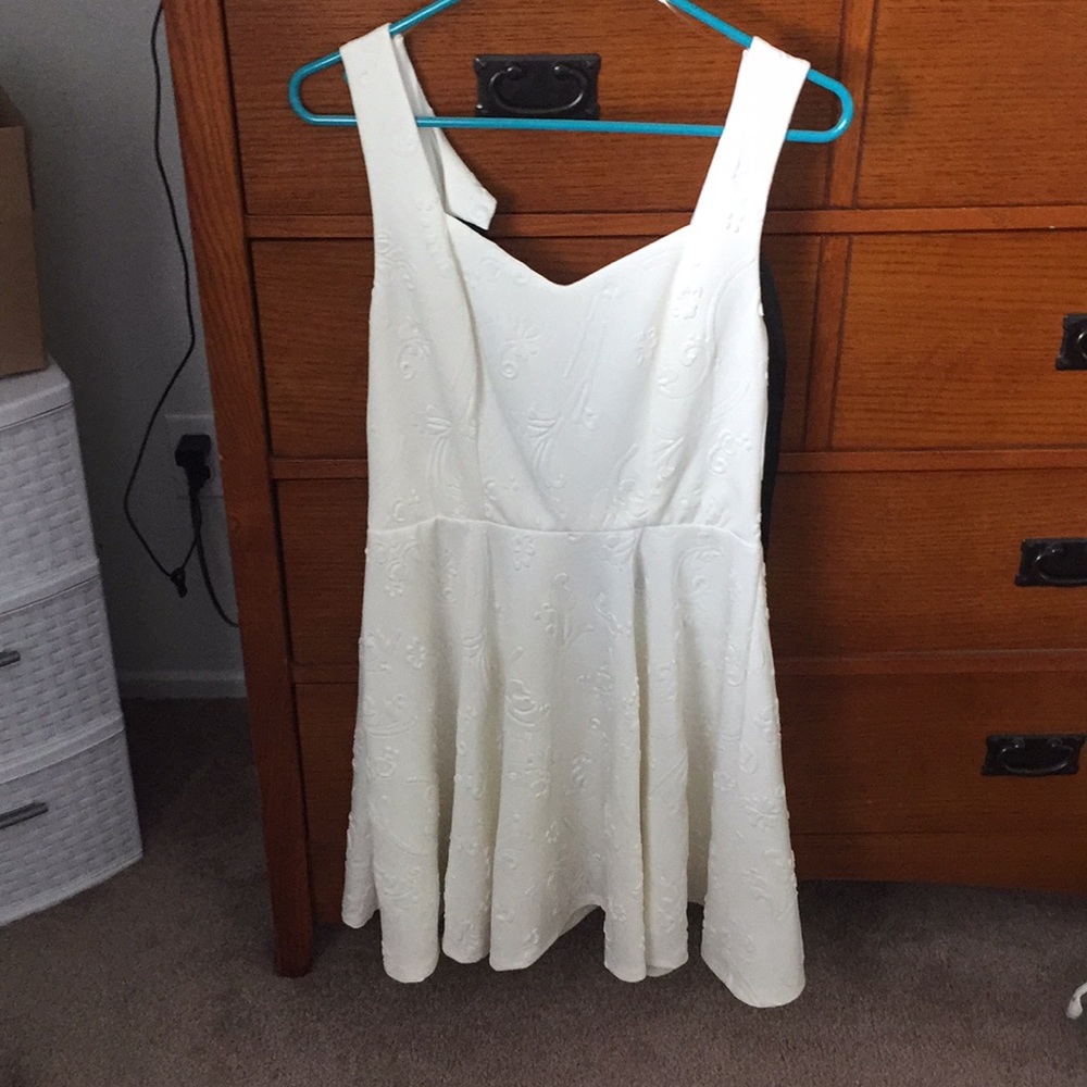 Cream dress with bow tie back